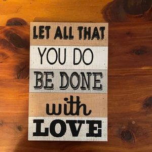 “Let all that you do be done with love” sign